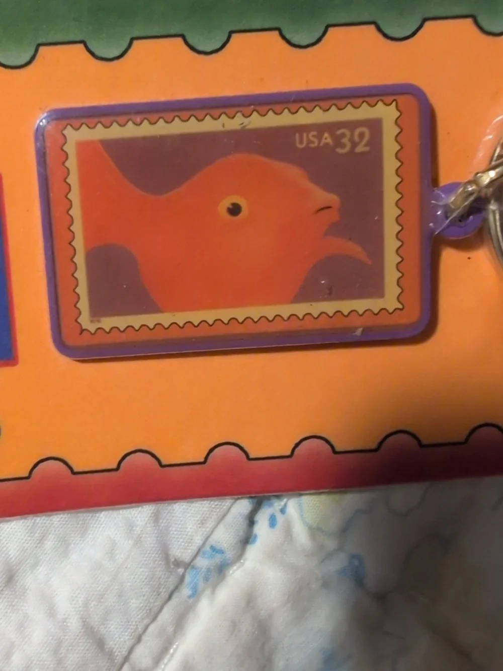 Vintage US Postal Bright Eyes 32 Cent Stamp Brass Enamel Keychain NIP‎